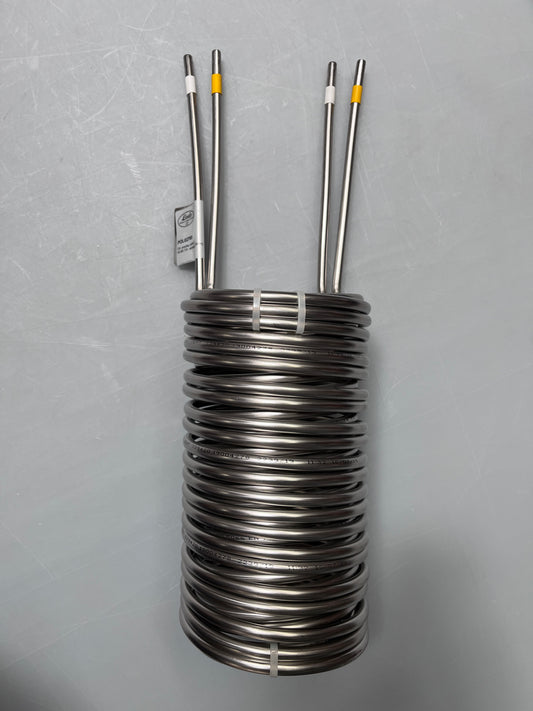 Coiled stainless tube with two tubes on a gray background POL02765