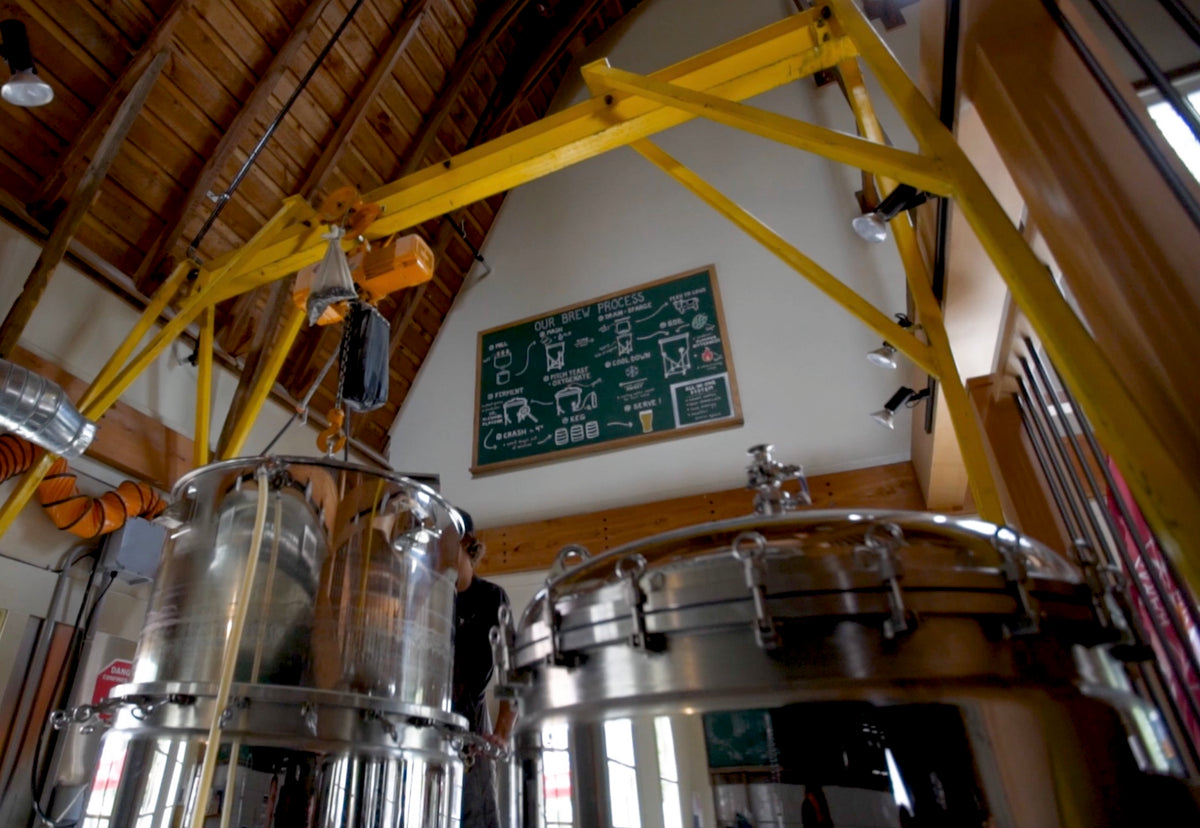 BREWHA Mash Colander being lifted with an overhead hoist